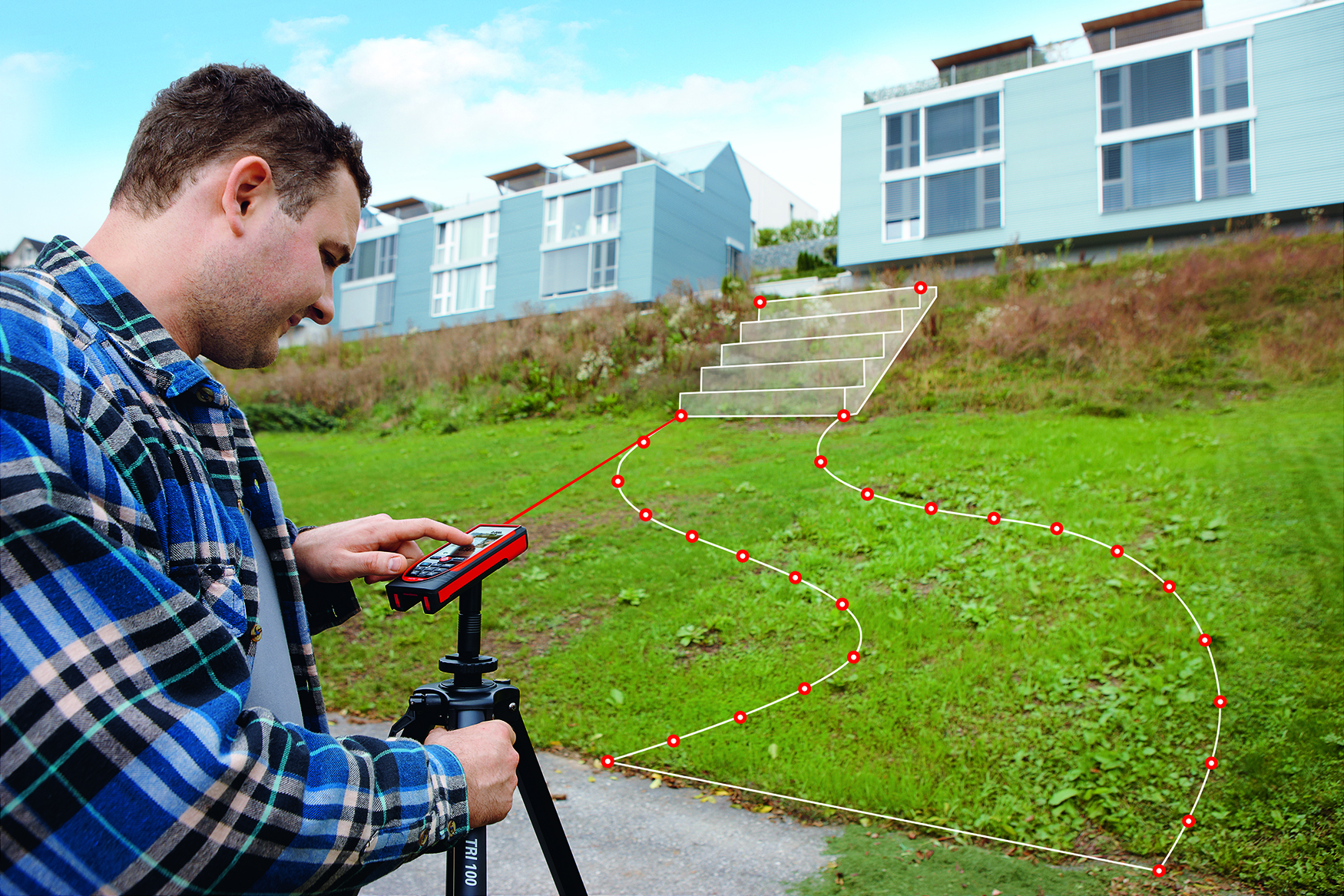 A man uses the Leica DISTO S910 laser measure and the P2P function to measure the future course of a path from the steps