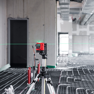Leica Lino L6G in a wide room, projects lines onto walls and ceiling